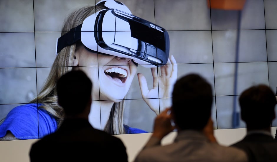 vsitors attending a presentation of the virtual reality headset gear vr photo afp