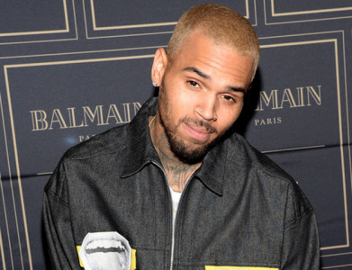 singer chris brown arrested for pointing gun at woman