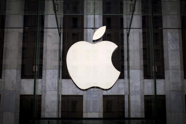 an apple logo hangs above the entrance to the apple store on 5th avenue in the manhattan borough of new york city july 21 2015 photo reuters