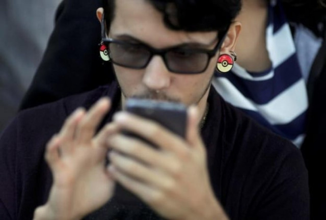 the game has also been blamed for injuries and robberies of distracted users in some countries photo reuters