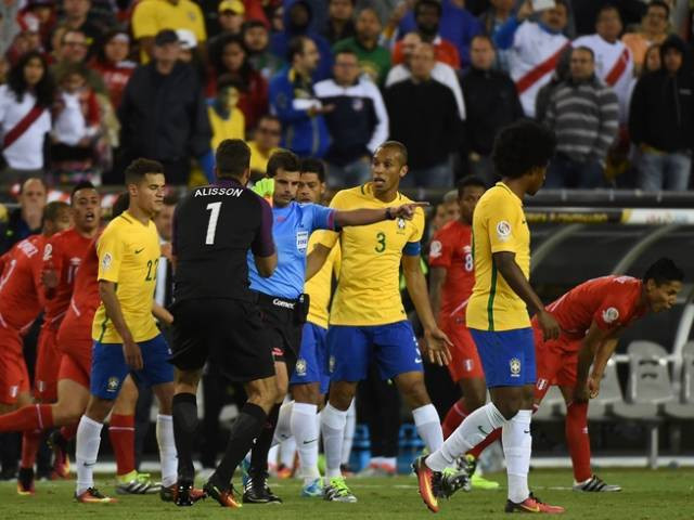 brazilian footballers argue with uruguayan referee andres cunha c as he consults his assistants before awarding a goal to peru during the copa america centenario football tournament in foxborough massachusetts united states on june 12 2016 photo afp brazilian footballers argue with uruguayan referee andres cunha c as he consults his assistants before awarding a goal to peru during the copa america centenario football tournament in foxborough massachusetts united states on june 12 2016 photo afp