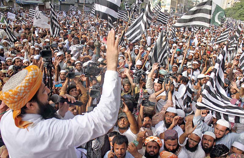 activists of jui f held a rally demanding transfer of slain party leader dr khalid soomro s murder case to military court at ma jinnah road the protest ended after sindh government accepted their demand photo ppi