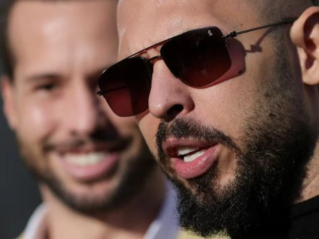 andrew tate next to his brother tristan tate talks to media representatives after exiting the bucharest courthouse in bucharest romania january 9 2025 photo reuters