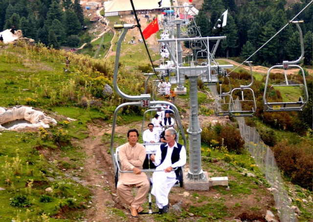 pti chief imran khan and k p chief minister pervaiz khattak sit on a chairlift at malam jabba resort photo express pti chief imran khan and k p chief minister pervaiz khattak sit on a chairlift at malam jabba resort photo express