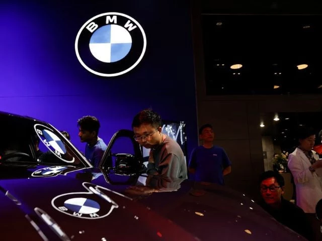 visitors look at vehicle on display at the bmw booth at the beijing international automotive exhibition or auto china 2024 in beijing china april 25 2024 photo reuters visitors look at vehicle on display at the bmw booth at the beijing international automotive exhibition or auto china 2024 in beijing china april 25 2024 photo reuters