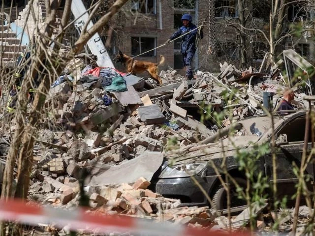 a rescuer with a service dog looks for residents who could still be under rubber of a destroyed residential building which was hit during a russian missile strike amid russia s attack on ukraine in kyiv ukraine april 24 2025 photo reuters a rescuer with a service dog looks for residents who could still be under rubber of a destroyed residential building which was hit during a russian missile strike amid russia s attack on ukraine in kyiv ukraine april 24 2025 photo reuters