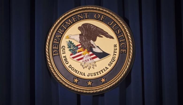 the department of justice doj logo is pictured on a wall after a news conference in new york photo reuters