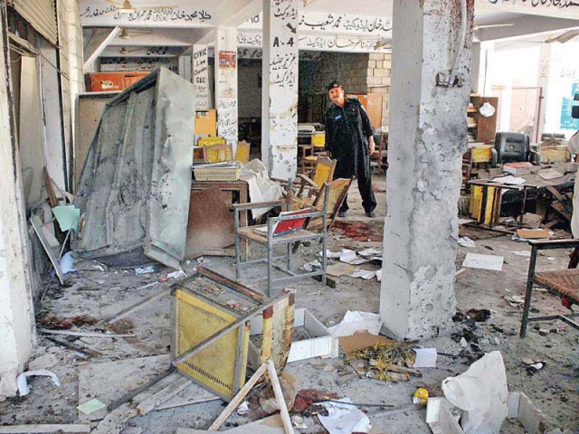 a security officer walks through the destroyed offices after the bombing photo app a security officer walks through the destroyed offices after the bombing photo app