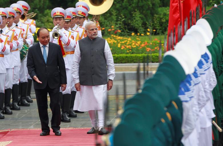 india 039 s prime minister narendra modi r reviews the guard of honour with his vietnamese counterpart nguyen xuan phuc during a welcoming ceremony at the presidential palace in hanoi vietnam september 3 2016 photo reuters