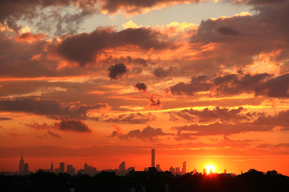 the sunset is seen over new york on september 1 2016 photo afp
