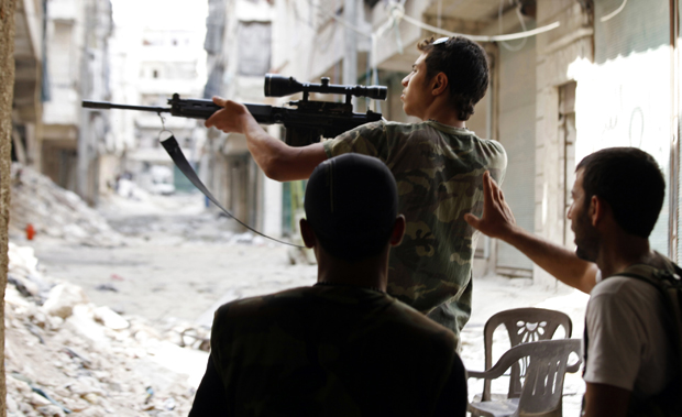 picture shows a young boy using sniper gun in syria photo reuters file