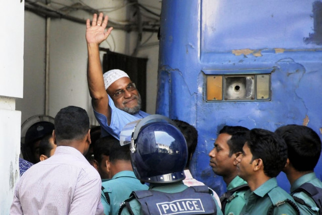 jamaat e islami party leader mir quasem ali waves his hand as he enters a van at the international crimes tribunal court in dhaka on november 2 2014 photo afp jamaat e islami party leader mir quasem ali waves his hand as he enters a van at the international crimes tribunal court in dhaka on november 2 2014 photo afp