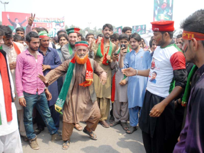 an elderly pti activist performs a dance at the rally photo abid nawaz express