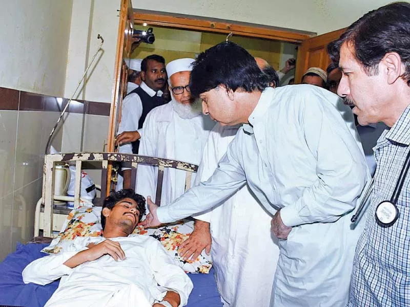 the interior minister inquires about the health of a man injured in the mardan blast photo app the interior minister inquires about the health of a man injured in the mardan blast photo app