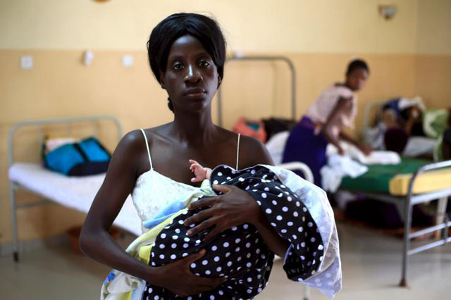 a mother holds her baby at kisenyi health centre in uganda 039 s capital kampala april 10 2015 photo reuters