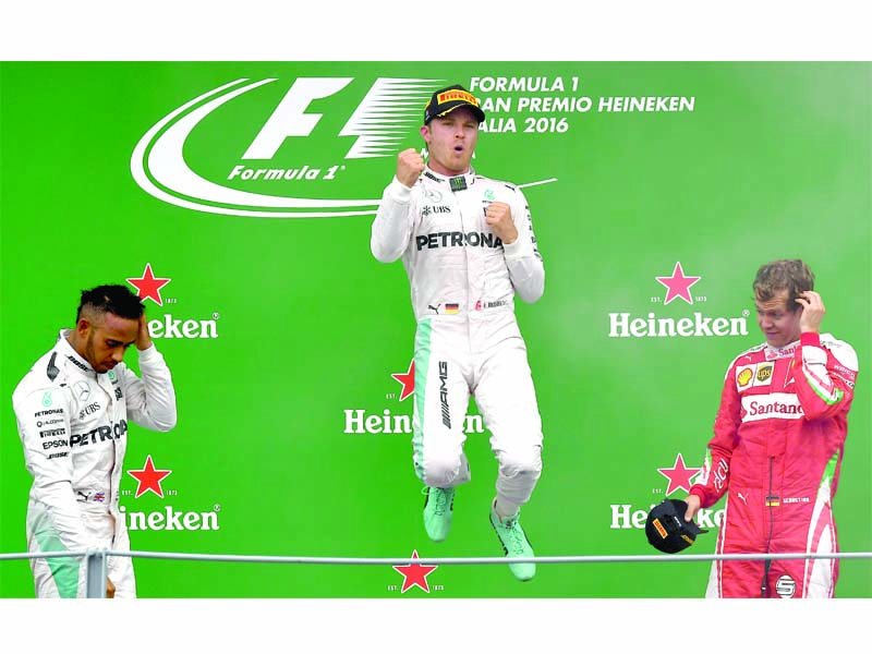 rosberg jumps for joy on the podium after winning the italian grand prix yesterday photo afp