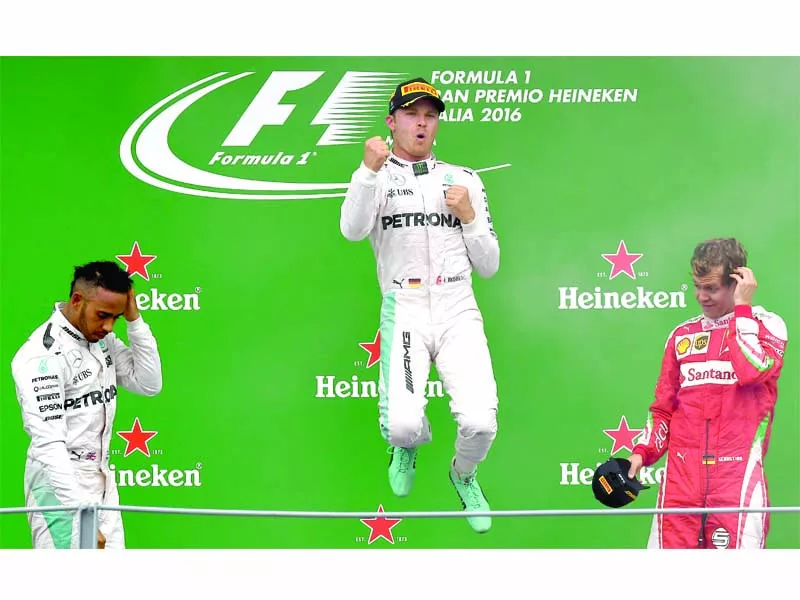 rosberg jumps for joy on the podium after winning the italian grand prix yesterday photo afp rosberg jumps for joy on the podium after winning the italian grand prix yesterday photo afp