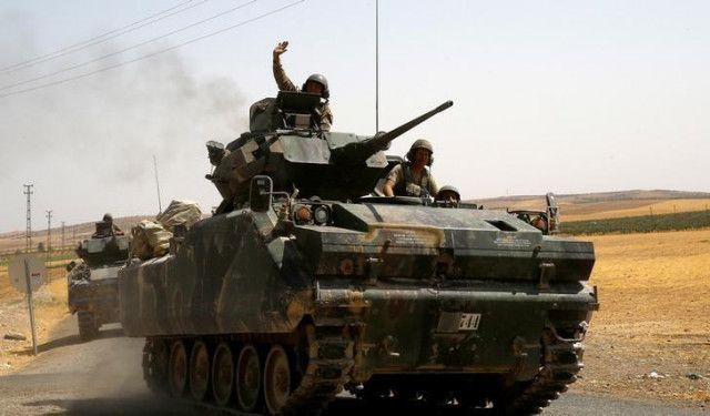a turkish soldier on an armoured personnel carrier waves as it is driven from the border back to their base in karkamis on the turkish syrian border in the southeastern gaziantep province turkey august 27 2016 photo reuters a turkish soldier on an armoured personnel carrier waves as it is driven from the border back to their base in karkamis on the turkish syrian border in the southeastern gaziantep province turkey august 27 2016 photo reuters