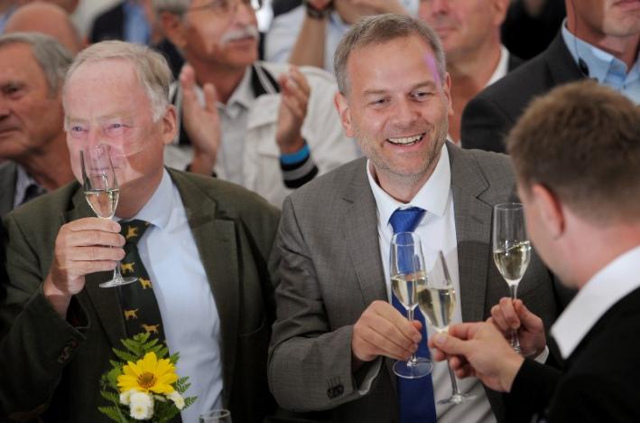 top candidate leif erik holm and alexander gauland of the anti immigration party alternative for germany afd react after first exit polls during the mecklenburg vorpommern state election at the party post election venue in schwerin germany september 4 2016 photo reuters