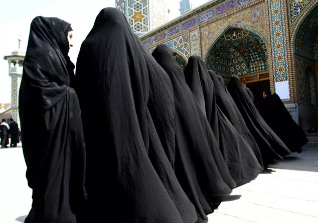 under iranian law women must wear a manteau or similar item that loosely covers the whole body from the neck down to the knee photo afp under iranian law women must wear a manteau or similar item that loosely covers the whole body from the neck down to the knee photo afp