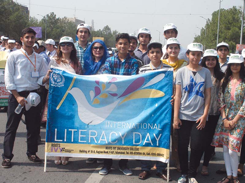 a large number of students and officials participated in the literacy walk photo waseem nazir express