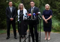 new south wales premier chris minns speaks during a press conference to give an update on the deadly shooting at bondi beach with minister for police and counter terrorism yasmin catley and stephen bendle the convener of the australian gun safety alliance agsa at the nsw parliament in sydney australia december 22 afp