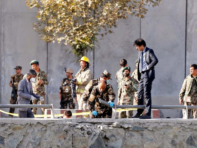 afghan security forces inspect the site of a suicide attack in kabul photo reuters afghan security forces inspect the site of a suicide attack in kabul photo reuters
