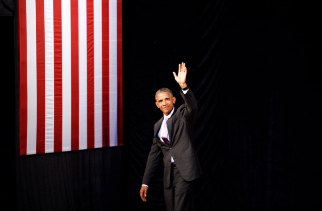 us president barack obama waves after delivering a speech about us laos relations at the lao national cultural hall in vientiane on september 6 2016 photo afp