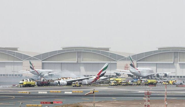 an emirates airline flight is seen after it crash landed at dubai international airport the uae august 3 2016 photo reuters