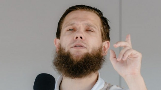 islamic preacher sven lau aka abu adam during a rally on july 19 2014 in hamburg northern germany photo afp islamic preacher sven lau aka abu adam during a rally on july 19 2014 in hamburg northern germany photo afp