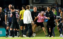 messi knocked down by fan