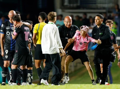 messi knocked down by fan messi knocked down by fan