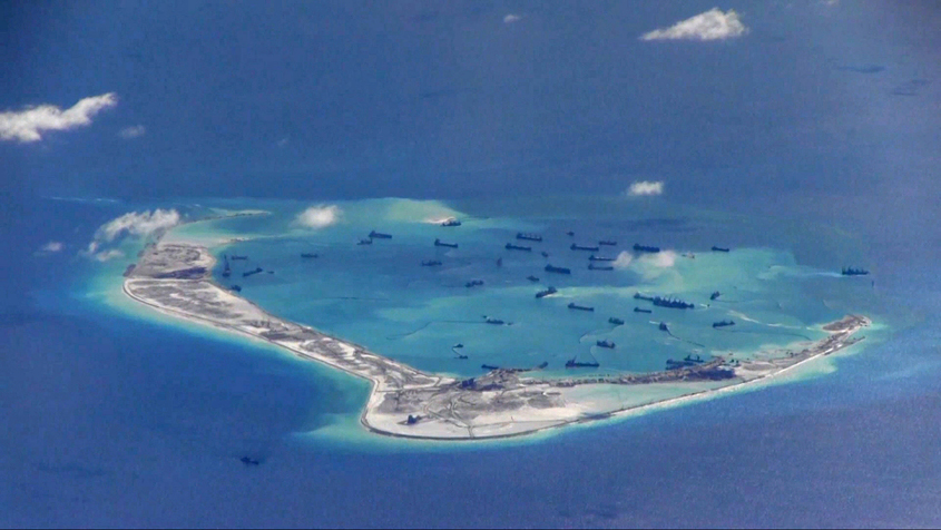 chinese dredging vessels are purportedly seen in the waters around mischief reef in the disputed spratly islands in the south china sea in this still image from video taken by a p 8a poseidon surveillance aircraft provided by the united states navy may 21 2015 photo reuters