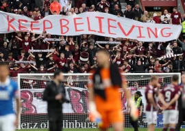 hearts held to offer celtic hope in scottish title race