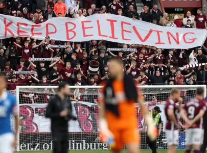 hearts held to offer celtic hope in scottish title race