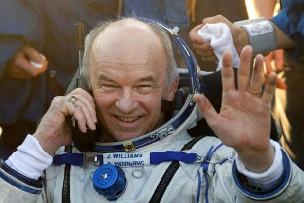 the international space station iss crew member jeff williams of the us waves as he speaks on a satellite phone after landing near the town of zhezkazgan dzhezkazgan kazakhstan september 7 2016 reuters