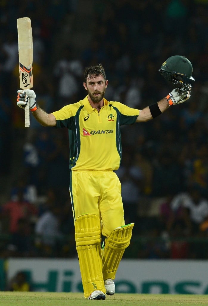 glenn maxwell raises his bat after scoring a century in pallekele on september 6 2016 photo afp