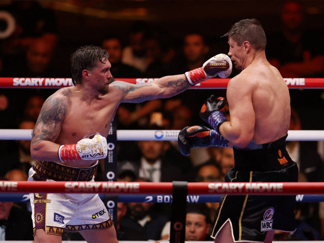 Usyk survives scare to stop Verhoeven