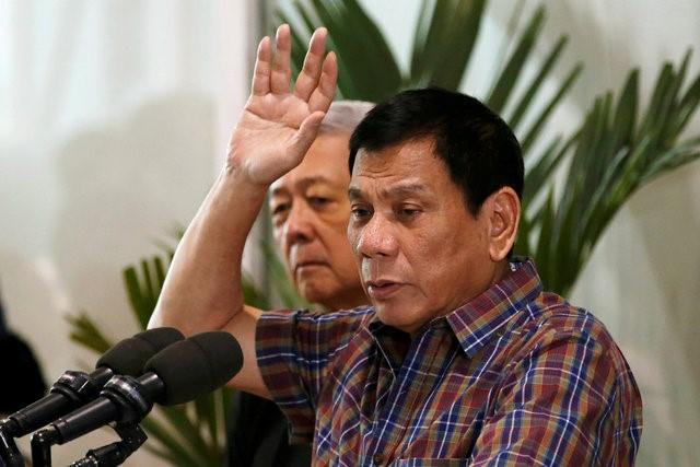 philippine president rodrigo duterte speaks before filipino workers who were repatriated by the philippine government from saudi arabia upon arrival at the ninoy aquino international airport in manila philippines august 31 2016 photo reuters