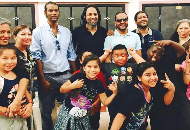 the band members visited schools in the us to educate underprivileged children about pakistan and its culture photo publicity the band members visited schools in the us to educate underprivileged children about pakistan and its culture photo publicity