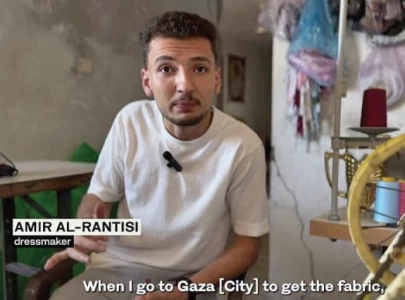 gaza tailor turns waste fabrics into dresses for girls