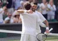 serbia s novak djokovic embraces russia s roman safiullin after winning their fourth round match photo reuters serbia s novak djokovic embraces russia s roman safiullin after winning their fourth round match photo reuters