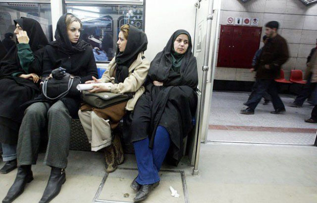 women sitting on a metro station in tehran photo afp