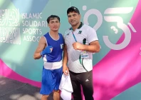 qudratullah confirmed second islamic solidarity games 2025 bronze medal for pakistan he poses with his coach nisar khan after the quarterfinal bout photo courtesy pbf qudratullah confirmed second islamic solidarity games 2025 bronze medal for pakistan he poses with his coach nisar khan after the quarterfinal bout photo courtesy pbf