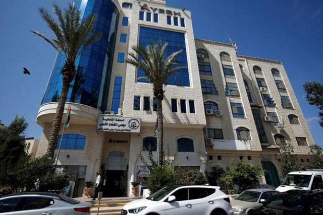 palestinians walk at the headquarters of the high court in the west bank city of ramallah september 8 2016 photo reuters palestinians walk at the headquarters of the high court in the west bank city of ramallah september 8 2016 photo reuters