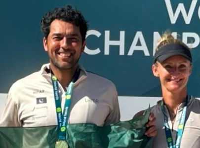aisam defends itf masters mixed doubles crown