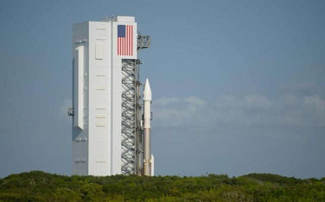 the united launch alliance atlas v rocket with nasa osiris rex spacecraft on board rolls out of the vertical integration facility to space launch complex 41 on september 7 2016 at cape canaveral air force station in florida photo afp the united launch alliance atlas v rocket with nasa osiris rex spacecraft on board rolls out of the vertical integration facility to space launch complex 41 on september 7 2016 at cape canaveral air force station in florida photo afp