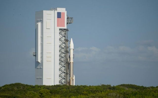 the united launch alliance atlas v rocket with nasa osiris rex spacecraft on board rolls out of the vertical integration facility to space launch complex 41 on september 7 2016 at cape canaveral air force station in florida photo afp