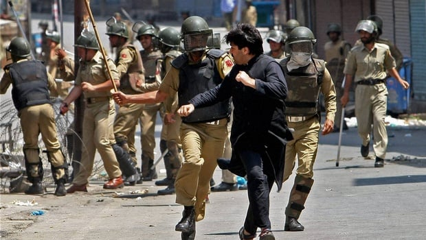 a young man was killed when his head was hit with tear gas canister while another died of pellet injuries photo afp