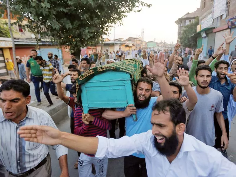 kashmiri men carry the coffin of abdul qayoom who was beaten by indian police and succumbed to his injuries at a hospital photo reuters kashmiri men carry the coffin of abdul qayoom who was beaten by indian police and succumbed to his injuries at a hospital photo reuters